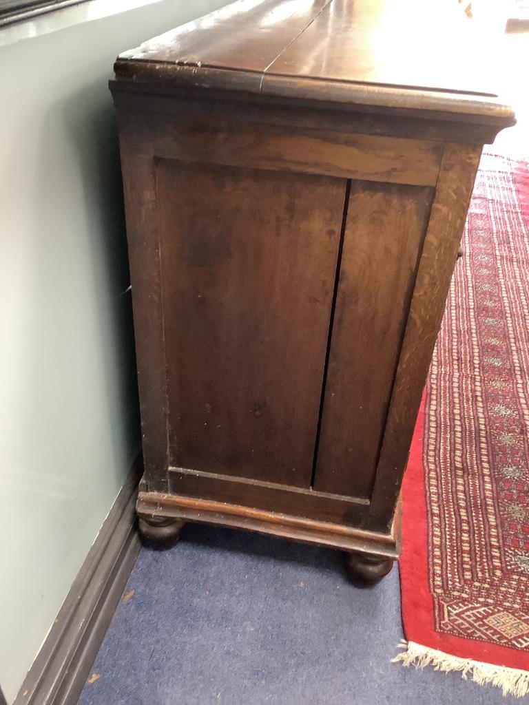 An 18th century oak low dresser, width 182cm depth 47cm height 89cm